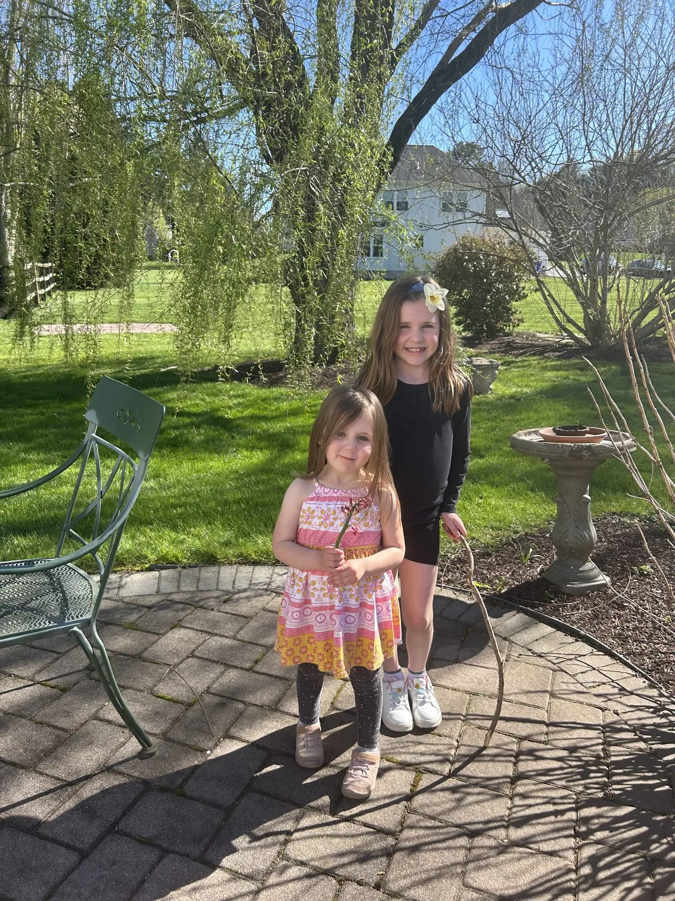 Children in the garden on a spring afternoon